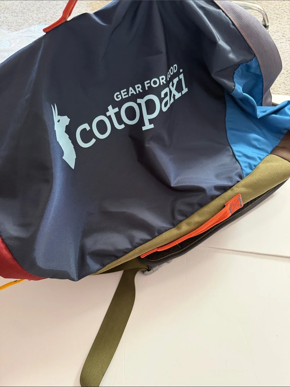 the Cotopaxi Uyuni 46L Duffel Bag (Del Día Edition).